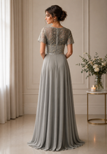 Ladda upp bild till gallerivisning, Aftonklänning / Balklänning  Susanna Rivieri 312123 grey/sand